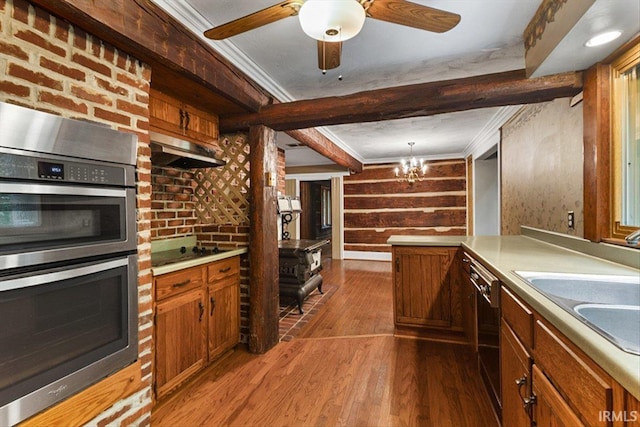 3911 Kings Ridge Rd, Mitchell, IN 47446 - kitchen featuring black appliances, under cabinet range hood, beam ceiling, dark wood-style floors, and brown cabinets