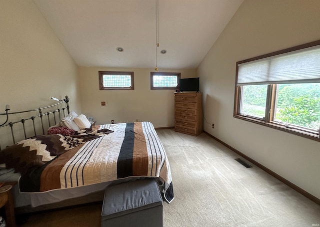 3108 E Charles Ct, Bloomington, IN 47401 - bedroom featuring lofted ceiling and light colored carpet