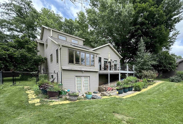 3108 E Charles Ct, Bloomington, IN 47401 - rear view of house with french doors, a wooden deck, and roof with shingles