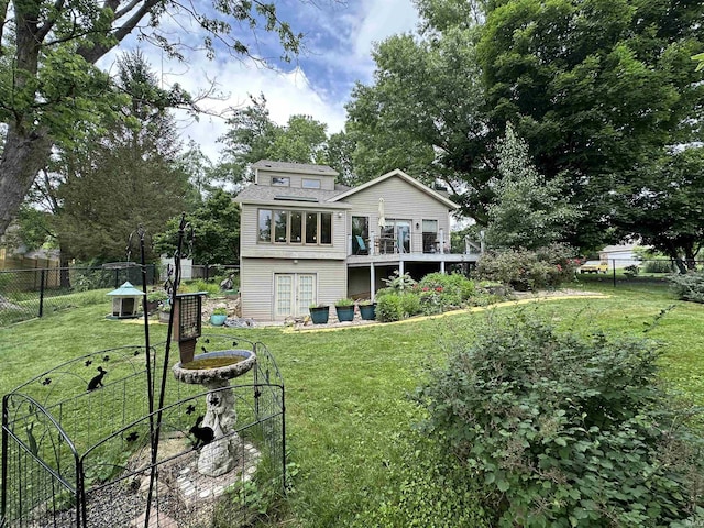 3108 E Charles Ct, Bloomington, IN 47401 - back of property with french doors, a wooden deck, and a shingled roof