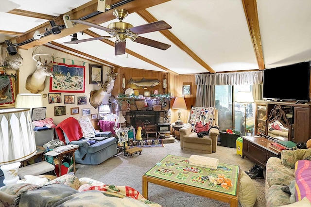 5462/5550 Patricksburg Rd, Spencer, IN 47460 - living room with carpet, a ceiling fan, and a stone fireplace