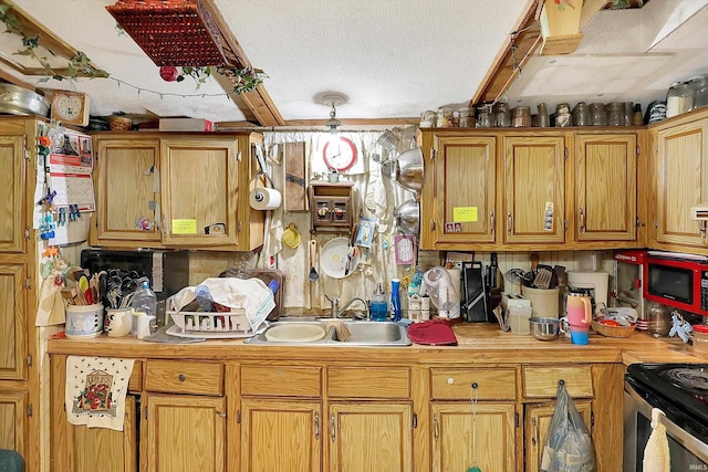 5462/5550 Patricksburg Rd, Spencer, IN 47460 - kitchen featuring a textured ceiling and electric stove