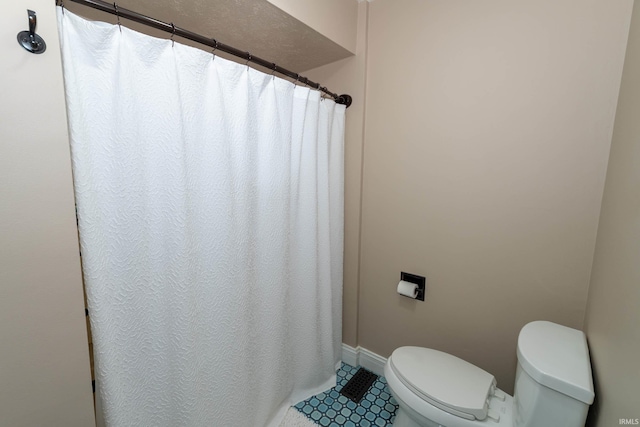 18199 Stoneridge St Apt A, South Bend, IN 46637 - full bathroom featuring tile patterned floors and a shower with shower curtain