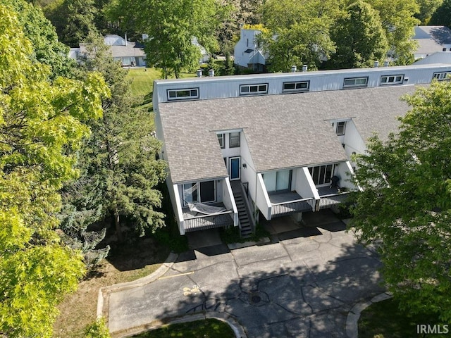 18199 Stoneridge St Apt A, South Bend, IN 46637 - view of subject property with a tree filled landscape