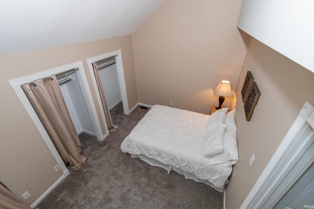 18199 Stoneridge St Apt A, South Bend, IN 46637 - carpeted bedroom featuring vaulted ceiling and baseboards