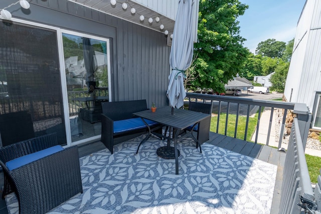 18199 Stoneridge St Apt A, South Bend, IN 46637 - wooden terrace featuring outdoor dining area
