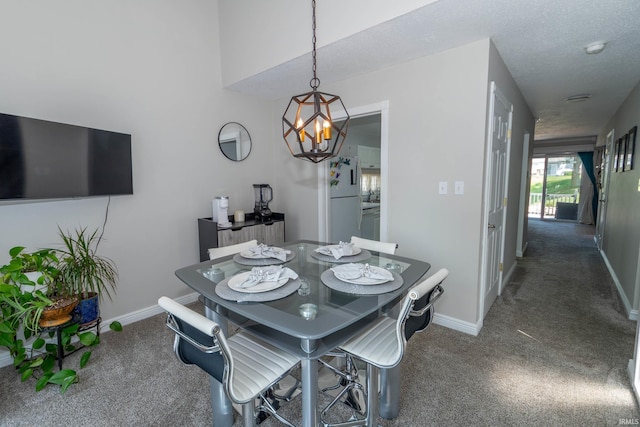 18199 Stoneridge St Apt A, South Bend, IN 46637 - carpeted dining space featuring a chandelier and baseboards