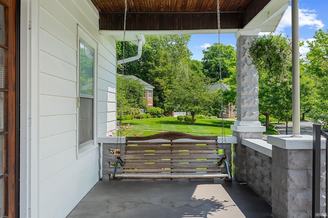 1028 Highland Ave, Lafayette, IN 47905 - covered porch with view of scattered trees