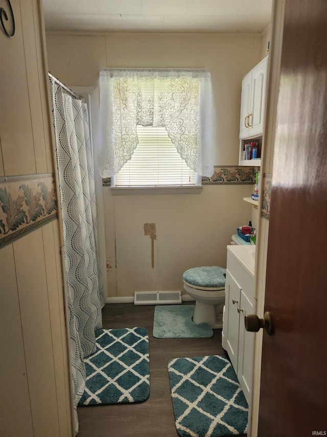 273 W Faculty St, Paoli, IN 47454 - full bath featuring wood finished floors, vanity, and curtained shower