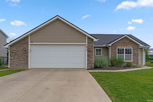 7070 Desdemona Xing, Fort Wayne, IN 46818 - single story home featuring stone siding, concrete driveway, and a front lawn