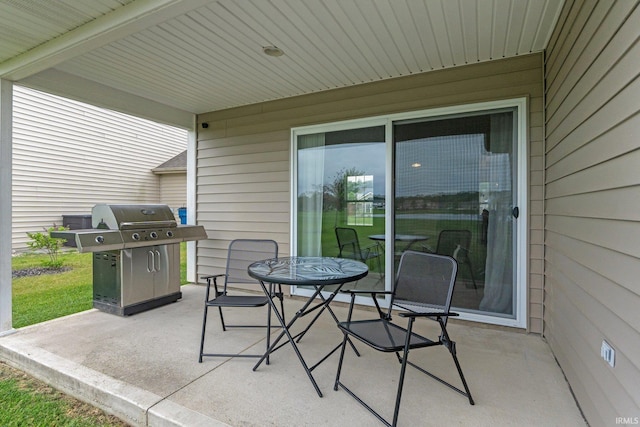 7070 Desdemona Xing, Fort Wayne, IN 46818 - view of patio with a grill and outdoor dining area
