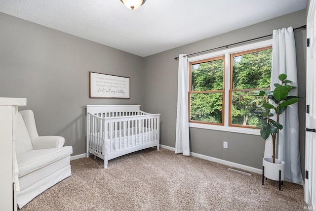 14341 Teal Ct, Granger, IN 46530 - bedroom featuring carpet flooring and a crib