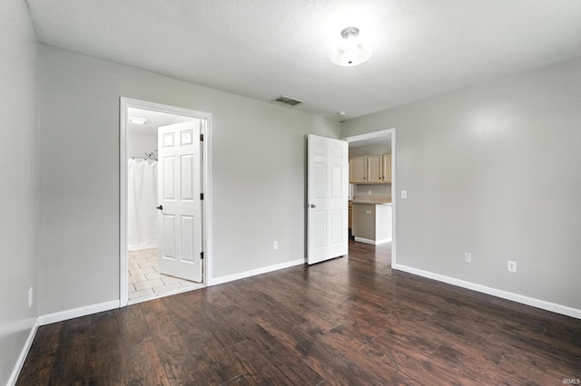 2005 Priscilla Ln, Kendallville, IN 46755 - unfurnished bedroom featuring wood finished floors and connected bathroom