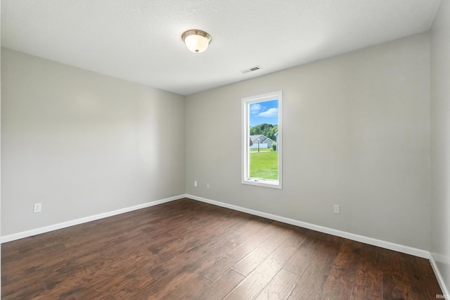 2005 Priscilla Ln, Kendallville, IN 46755 - empty room with baseboards and dark wood-type flooring
