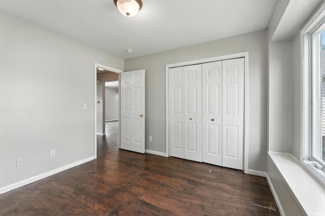 2005 Priscilla Ln, Kendallville, IN 46755 - unfurnished bedroom featuring dark wood-style flooring and a closet