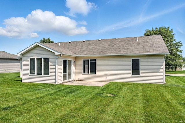 2005 Priscilla Ln, Kendallville, IN 46755 - rear view of house with a lawn, a patio area, and roof with shingles