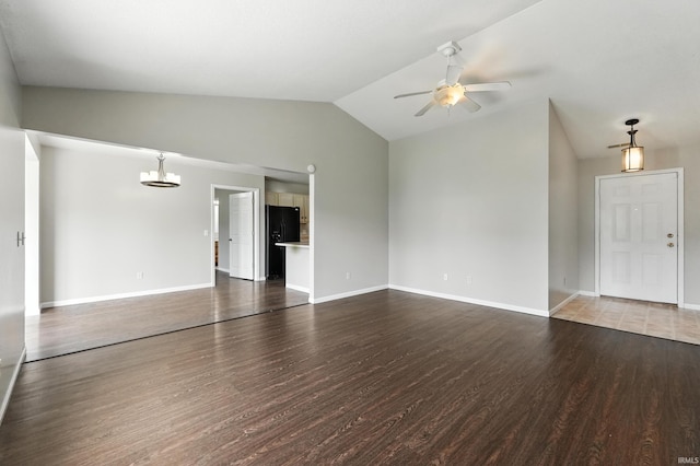 2005 Priscilla Ln, Kendallville, IN 46755 - unfurnished living room with wood finished floors, a ceiling fan, and vaulted ceiling