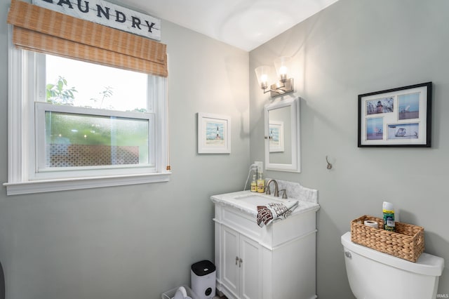 1308 N Buckeye Rd, Muncie, IN 47304 - bathroom with vanity and a chandelier