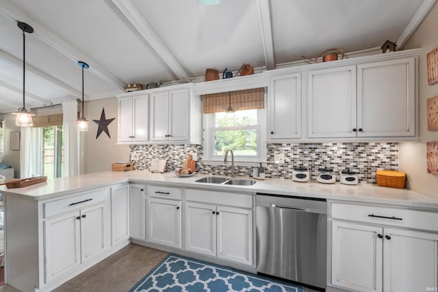 1308 N Buckeye Rd, Muncie, IN 47304 - kitchen with stainless steel dishwasher, a peninsula, tasteful backsplash, white cabinetry, and beam ceiling