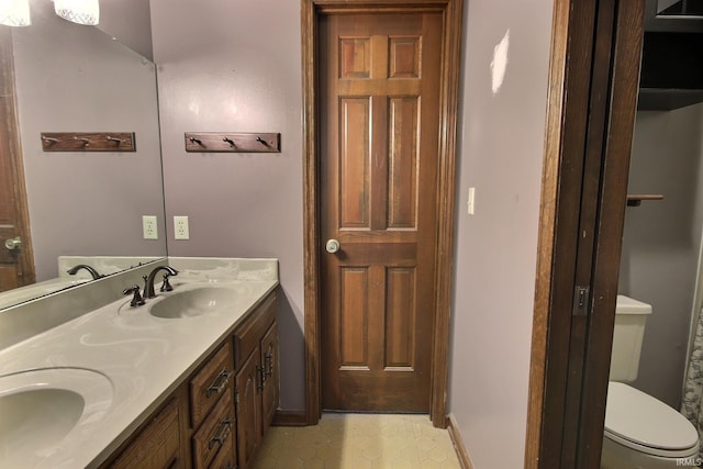 8426 Creekside Pl, Fort Wayne, IN 46804 - bathroom featuring double vanity and tile patterned floors