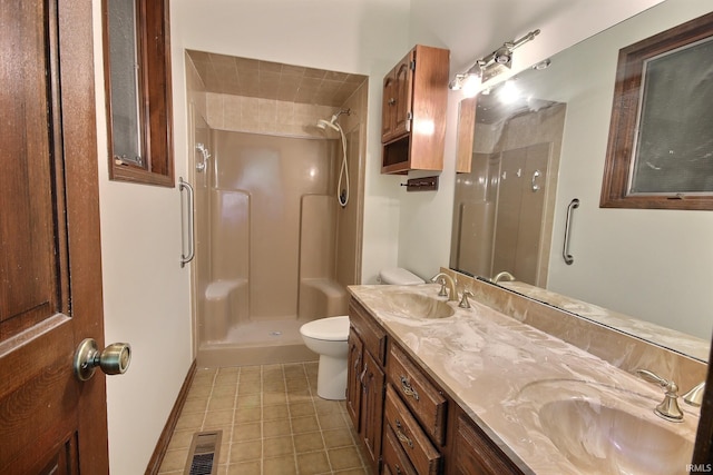 8426 Creekside Pl, Fort Wayne, IN 46804 - bathroom with a stall shower, double vanity, and tile patterned flooring