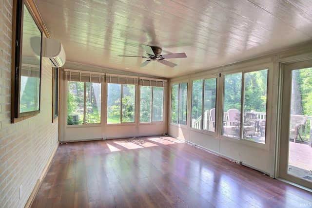 8426 Creekside Pl, Fort Wayne, IN 46804 - unfurnished sunroom featuring a ceiling fan, hardwood / wood-style floors, a wall mounted air conditioner, and brick wall