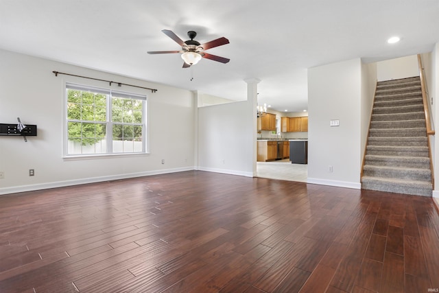 3746 Rolling Rock Dr, Evansville, IN 47711 - unfurnished living room featuring a ceiling fan, wood finished floors, stairs, and recessed lighting