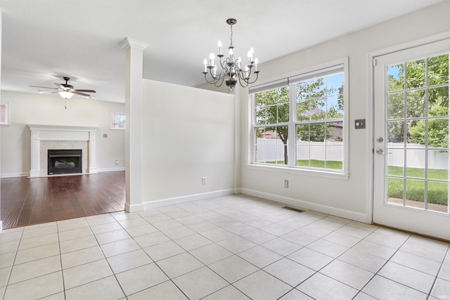 3746 Rolling Rock Dr, Evansville, IN 47711 - unfurnished dining area featuring a ceiling fan, healthy amount of natural light, and a chandelier