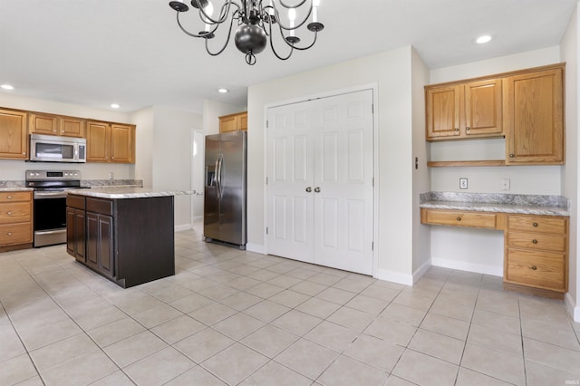 3746 Rolling Rock Dr, Evansville, IN 47711 - kitchen featuring stainless steel appliances, built in desk, recessed lighting, open shelves, and light tile patterned floors