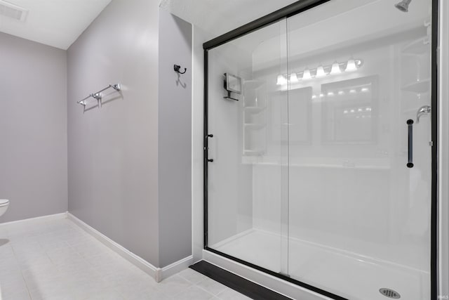 3746 Rolling Rock Dr, Evansville, IN 47711 - bathroom featuring a stall shower and tile patterned flooring