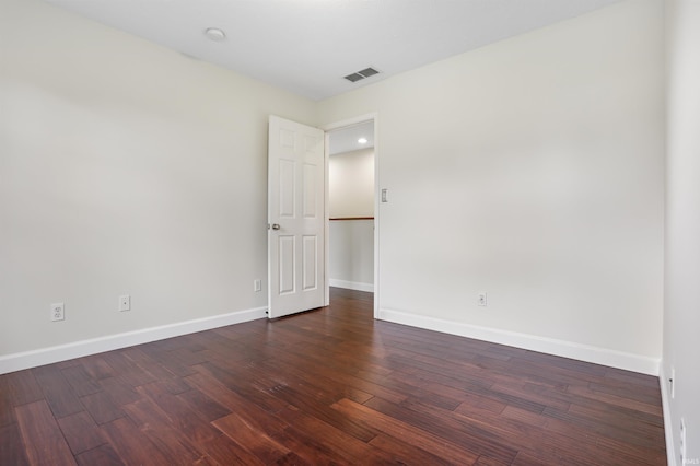 3746 Rolling Rock Dr, Evansville, IN 47711 - spare room with baseboards and dark wood-type flooring