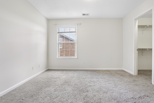 3746 Rolling Rock Dr, Evansville, IN 47711 - unfurnished bedroom with a spacious closet, carpet, and a closet