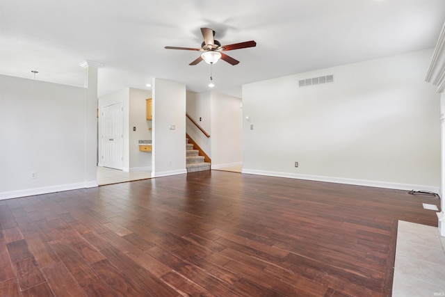 3746 Rolling Rock Dr, Evansville, IN 47711 - unfurnished living room featuring ceiling fan, stairs, wood finished floors, and recessed lighting