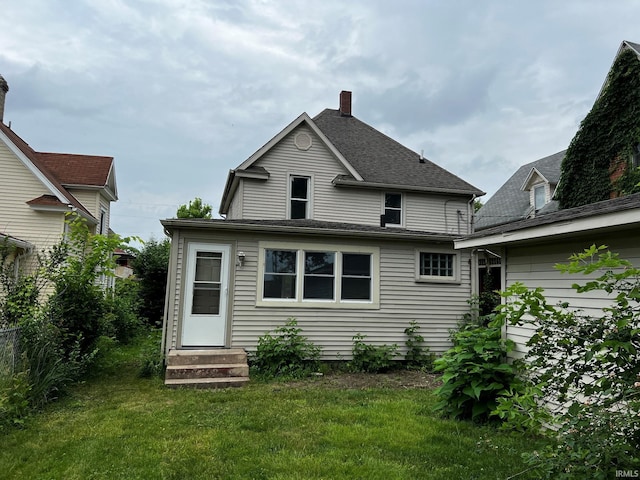 1026 E Wayne St, South Bend, IN 46617 - back of house featuring entry steps and a chimney
