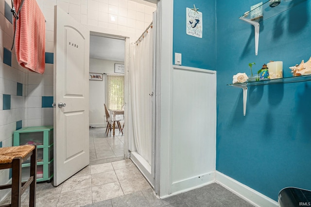 405 Middlebury St, Goshen, IN 46528 - bathroom featuring tile patterned floors and baseboards