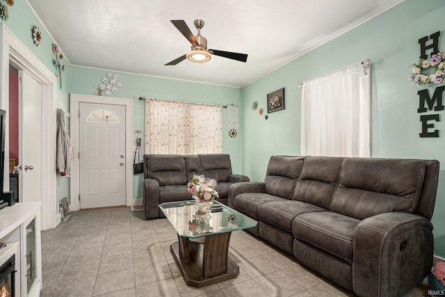 405 Middlebury St, Goshen, IN 46528 - living room with ceiling fan and light tile patterned floors