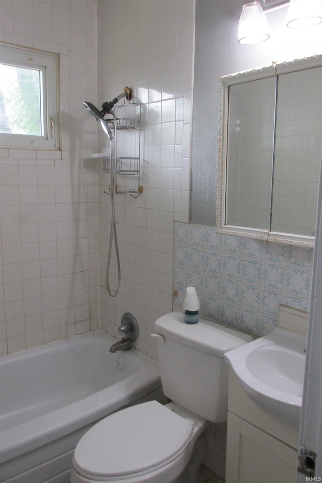 907 S Tennessee, Muncie, IN 47302 - full bath featuring vanity, tile walls, and bathing tub / shower combination