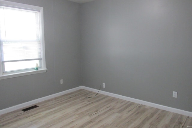 907 S Tennessee, Muncie, IN 47302 - empty room with light wood finished floors and baseboards