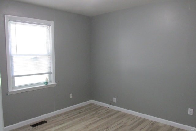907 S Tennessee, Muncie, IN 47302 - empty room featuring light wood-style flooring and baseboards