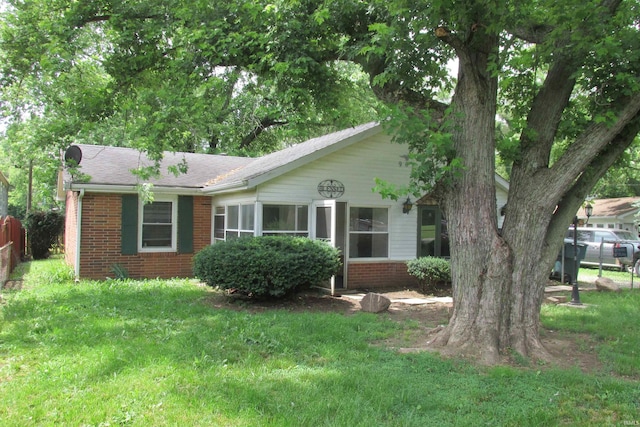 907 S Tennessee, Muncie, IN 47302 - view of front of home with brick siding and roof with shingles
