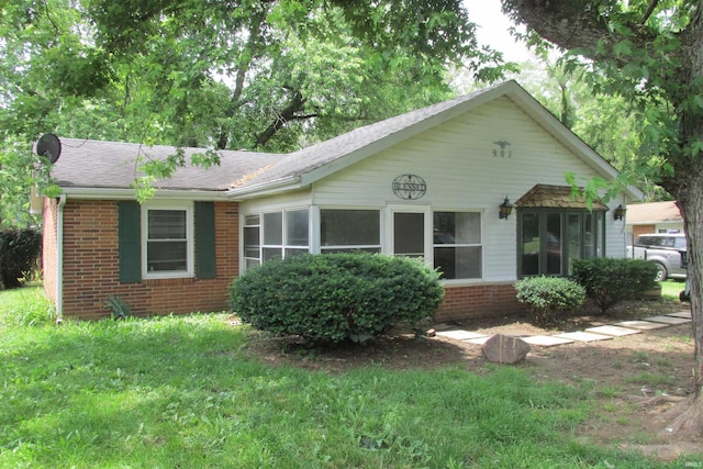 907 S Tennessee, Muncie, IN 47302 - bungalow featuring brick siding and roof with shingles