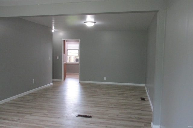 907 S Tennessee, Muncie, IN 47302 - spare room featuring light wood-style floors and baseboards