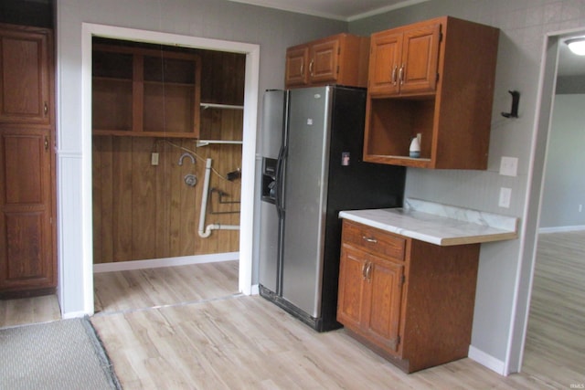 907 S Tennessee, Muncie, IN 47302 - kitchen featuring stainless steel fridge with ice dispenser, open shelves, and light wood-style floors