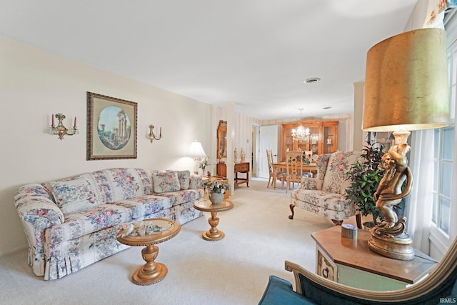 16801 Darling Rd, Woodburn, IN 46797 - carpeted living room featuring a chandelier