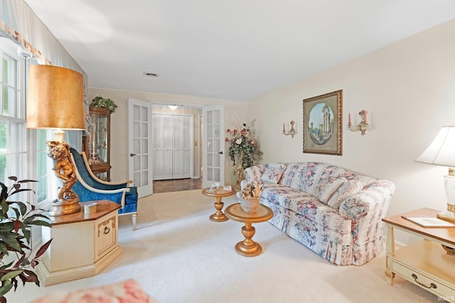 16801 Darling Rd, Woodburn, IN 46797 - carpeted living area featuring french doors