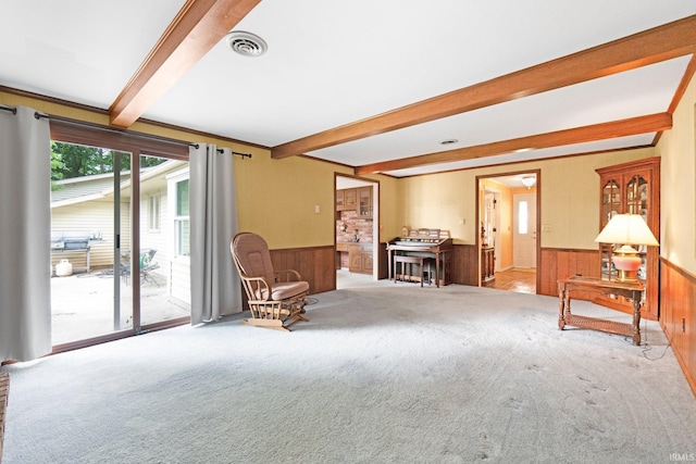 16801 Darling Rd, Woodburn, IN 46797 - sitting room with a wainscoted wall, beam ceiling, carpet, and wooden walls