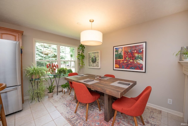 44 Fairfieldview Ct, Lafayette, IN 47905 - dining room with light tile patterned flooring and baseboards