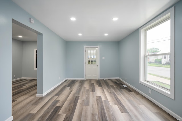 32 W Main St, Redkey, IN 47373 - unfurnished room featuring a smoke detector, wood finished floors, and recessed lighting