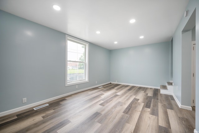 32 W Main St, Redkey, IN 47373 - unfurnished room with wood finished floors, recessed lighting, and a smoke detector