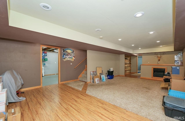 29876 County Road 18th Rd, Elkhart, IN 46517 - game room with recessed lighting, a fireplace, and wood finished floors
